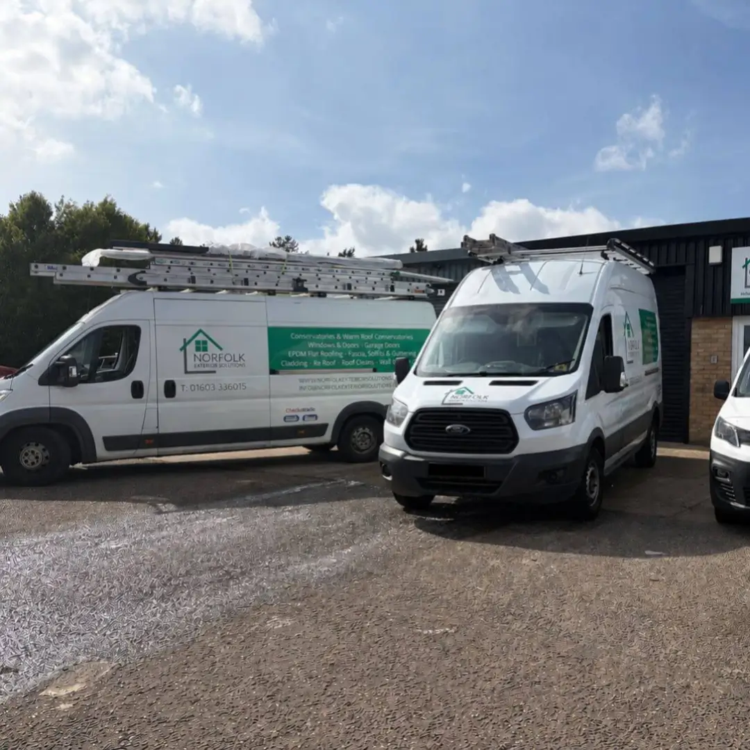 Norfolk Exterior Solutions company vans parked at their Unit 94 headquarters, ready for window and door installation projects across Norfolk